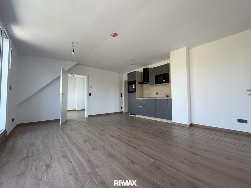 3-Zimmer-Erstbezug mit 23m² Terrasse und kleinen Balkon – Top-Lage &amp; bezugsfertig!
