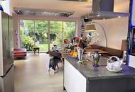 FAMILIENDOMIZIL MIT GARTEN UND GARAGE