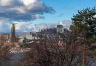 Wohnen über den Dächern von Graz mit Blick auf den Schlossberg: Exklusive Stadtwohnung mit Terrasse