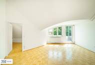 Lichtdurchflutete Dachwohnung mit weitläufigem Grünblick!