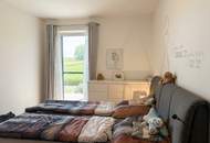 Moderne Gartenwohnung in schöner Wohnlage mit 2 KFZ-Stellplätzen
