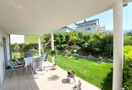 Miete. Neuwertige Wohnung mit Terrasse und Garten in Seeboden. Tiefgarage.