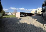 Miethaus mit 9 Wohnungen, Gemeinschaftsgarten und Carports