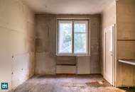 SANIERUNGSBEDÜRFTIGE 2 - ZIMMER WOHNUNG MIT FREIFLÄCHE UND GRÜNBLICK