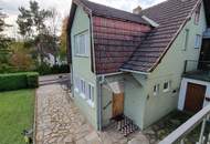 Vielseitiges Mehrfamilienhaus mit Charme und einladendem Garten