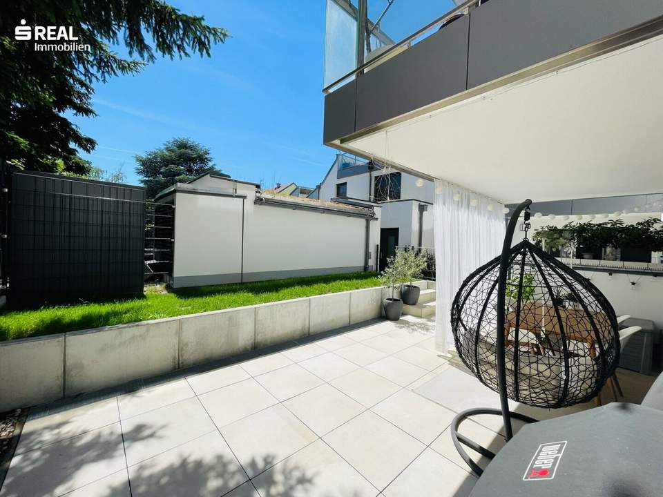 Hochwertige 3-4 Zimmer Gartenwohnung mit großer Terrasse & ausgebautem Hobbyraum