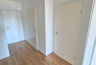 Moderne Neubauwohnung in mondäner Wohngegend mit Balkon