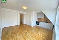 Moderne DG-Wohnung in ruhiger Spielstraße beim Familienplatz - Mit Einbauküche und Abstellraum! 2014/2015 erbaut!