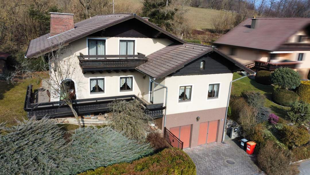 Einfamilienhaus am Sonnenberg – Hanglage mit Panoramablick &amp; Einliegerwohnung!