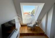 Dachgeschossmaisonette mit einer Traumterrasse und vollmöblierter Küche