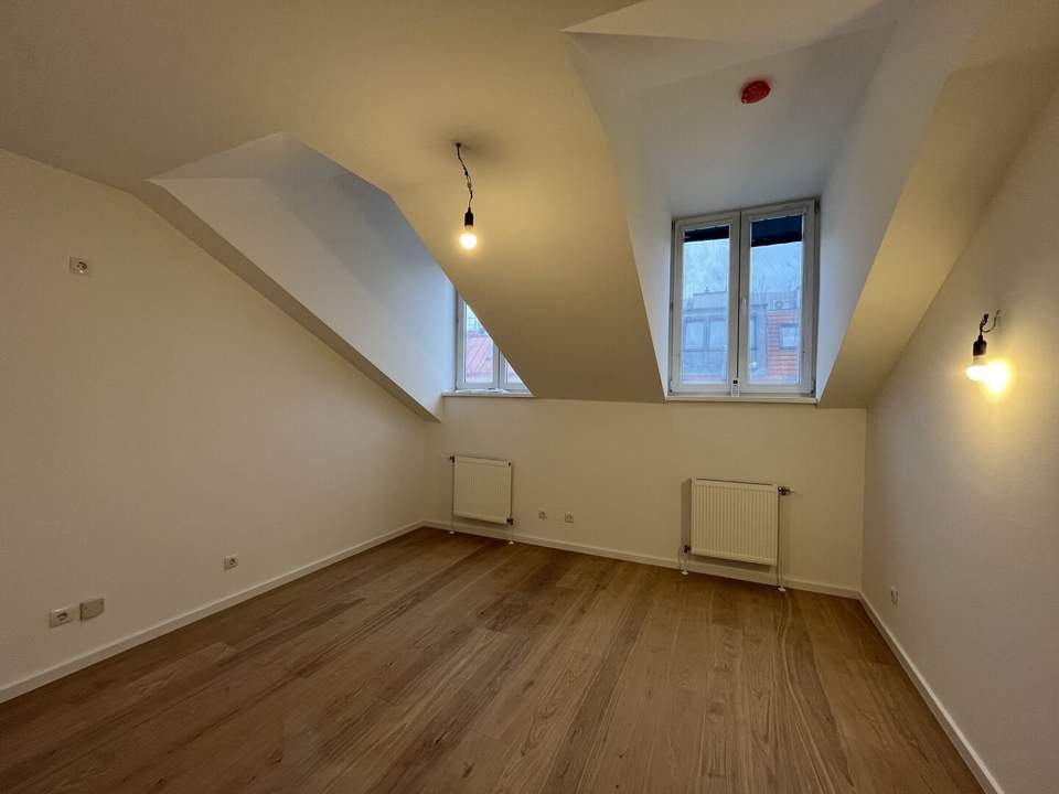 1030! Hübsche, generalsanierte 2-Zimmer Dachgeschoss Wohnung nahe U3!