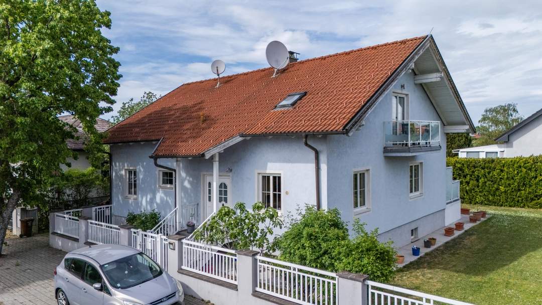 "Wohnkomfort auf mehreren Ebenen - mit großem Garten & Garage"
