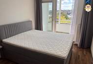 Neuwertige 2-Zimmer Wohnung mit 2 Loggien und Auto-Stellplatz