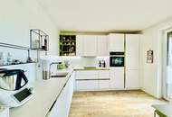 Familienfreundliche 4-Zimmer-Wohnung mit Tiefgaragenabstellplatz, Loggia, Gartenanlage & nachhaltiger Heizung