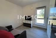 Helle Wohnung mit großer Terrasse 2 Autoabstellplätze
