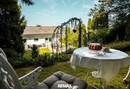 Wohntraum der Extraklasse: Exklusives Penthouse auf 2 Etagen mit großer Terrasse und schönem Garten in begehrter Lage