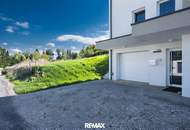 NEUBAU | Hochwertige Gartenwohnung mit traumhafter Küche, Terrasse und Garage in ruhiger Grünlage!