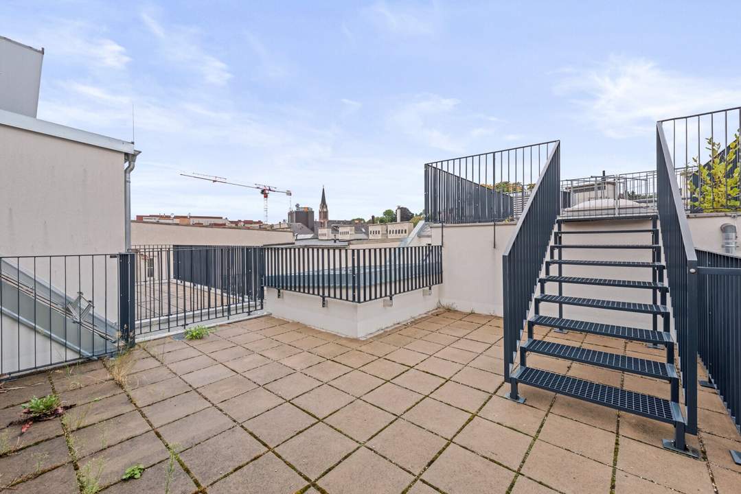 Erstbezug - Atemberaubende Dachterrasse in den Innenhof!