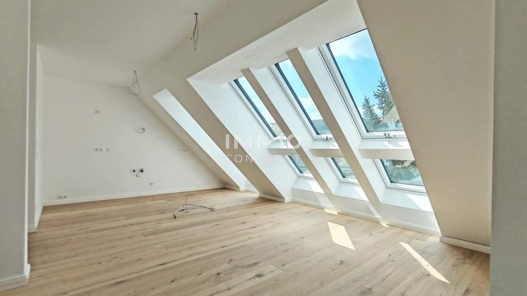 Wohnen auf höchstem Niveau – Einzigartige Dachgeschossresidenz mit Dachterrasse und Panoramablick