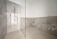 Süd-Terrasse | ERSTBEZUG DG-Wohnung mit 3 Zimmern | über 3m Raumhöhe | Klima &amp; Luftwärmepumpe | Tiefgaragenplatz