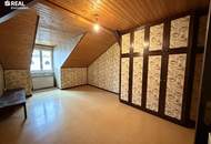 3-Zimmer-Dachgeschosswohnung mit Blick auf die Kirche – Top-Lage am Hauptplatz in Bruck an der Leitha