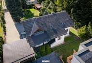 Großzügiges Haus mit sonnigem Garten, Carport, Garage und Fußbodenheizung!
