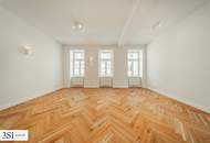 Exquisite Wohnqualität: Frisch sanierter Altbau mit sonnigem Balkon