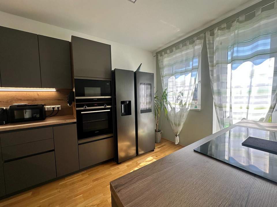 Einzigartige, moderne Eigentumswohnung mit Garten!