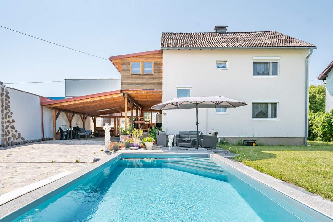 Ihre Lebenschance: Charmantes Zweifamilienhaus mit Pool & Gartenparadies!