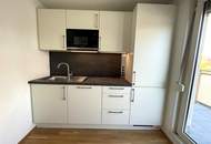 Erstbezug DG-Wohnung, 2 Terrassen, ruhig gelegen, Garage möglich.