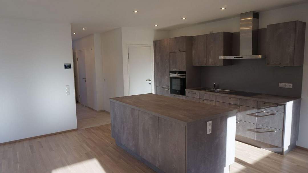 Moderne 2-Zimmer-Gartenwohnung mit Terrasse, Carport und Lager!