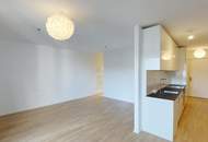 Sonnwendviertel: 1-Zimmer-Wohnung mit Balkon in der 8. Etage – Fitnessraum, Co-Working &amp; Rooftop-Terrasse inklusive!