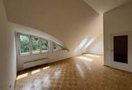 Klimatisierte, großzügige 2-Zimmer-Dachgeschosswohnung mit herrlichem Blick ins Grüne!