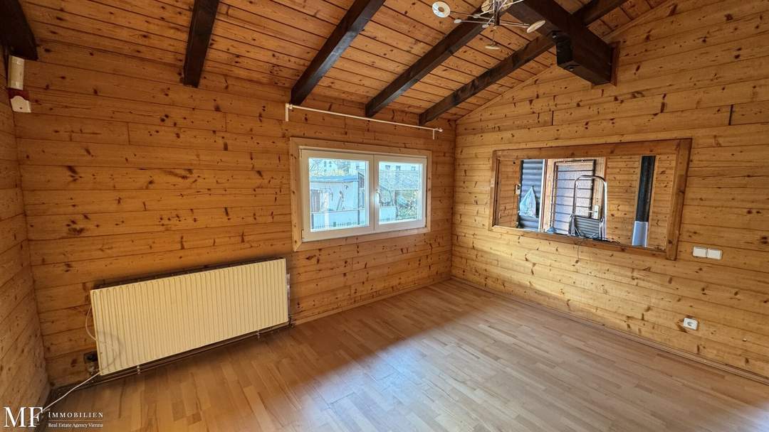 Urbanes Wohnen mit großem Garten mit kleinem Einfamilienhaus in Essling