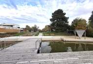 EXKLUSIVES SEEHAUS AM NEUFELDER SEE – MODERNES WOHNEN MIT PRIVATEM WASSERZUGANG