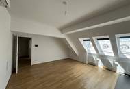 UNBEFRISTET - helle 2,5-Zimmer Dachgeschosswohnung mit Wohnküche, Schrankraum, 26 m2 Dachterrasse und Kellerabteil nahe Schönbrunn