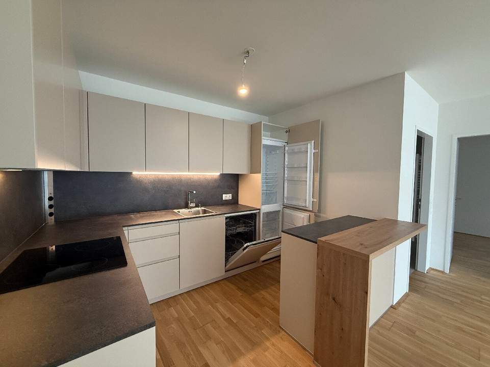 Neubau Erstbezug I hochwertige Küche I Nähe Donau I Fußbodenheizung I Balkon I Tiefgarage I Fernwärme I