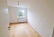 Kernsanierte, helle Dreizimmerwohnung mit großer Loggia und großem Keller!