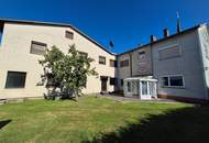 Mehrfamilienhaus mit Geschäftslokal