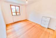 Geräumige 4-Zimmer-Wohnung mit Garten, Fernblick & Carport in Ruhelage