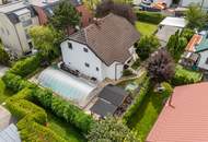 "Charmantes Einfamilienhaus mit Pool, großem Garten und modernem Wohnkomfort"