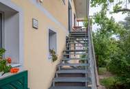 Dachgeschosswohnung in Ruhelage mit traumhaftem Grünblick, eigenem Garten und Garage