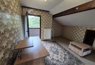 Großzügiges Einfamilienhaus mit Traumgarten und Garage