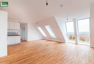 Moderne Dachgeschosswohnung mit Loggia und großer Dachterrasse in Grünlage