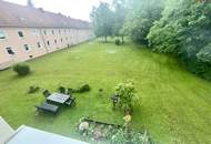 Ein Zuhause zum Verlieben: 4-Zimmer-Wohnung mit sonnigem Grünblick, lichtdurchfluteten Räumen, hochwertig saniertem Badezimmer, großzügiger Küche &amp; viel Platz für Familien!