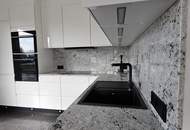 Design trifft Lebensqualität – Exklusive Neubauwohnung mit Seeblick