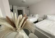 ZWEI EINKOMMENSQUELLEN UNTER EINEM DACH: Charmantes Café mit Gästezimmern – Wiener Flair &amp; stabile Stammkundschaft