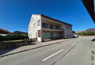 Mehrfamilienhaus mit Geschäftslokal