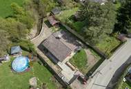 „Wohnen im Einklang mit der Natur – Stilvolles Holzhaus in traumhafter Ruhelage auf unverbaubarem Grundstück“