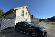 Einfamilienhaus Hohenems, Nahe Zentrum, großzügige Terrassenfläche mit Gartenanlage, neuer Zaun mit Sichtschutz, mehrere Außenstellplätze auf privatem Grundstück.